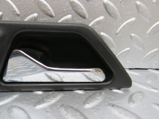 W124 interior door handle front left used OEM