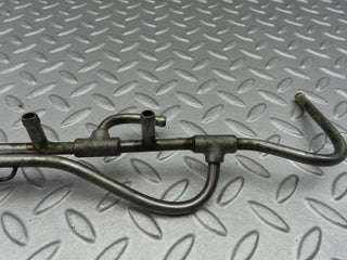 R107 SLC left side fuel injection pipe used OEM