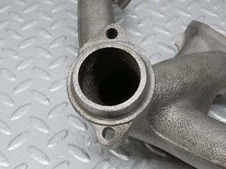 W123 exhaust manifold used OEM