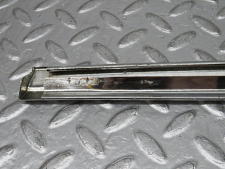 R107 SLC rear left window chrome used OEM