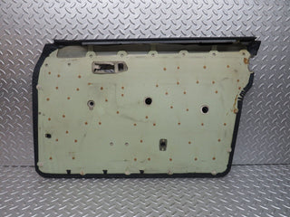 W123 front left door card blue used OEM