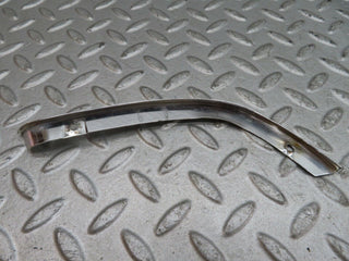 W116 headlight upper chrome trim left used OEM