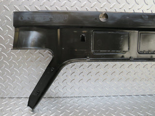 W124 trunk lock trim panel used OEM
