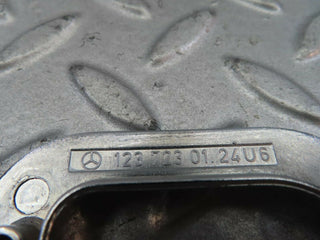 W123 left interior chrome door latch trim used OEM