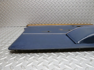 W109 front left door card blue used OEM