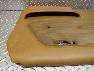 W123 front left door card palomino used OEM