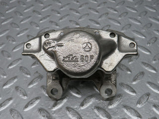 W124 Wagon rear left brake caliper used OEM