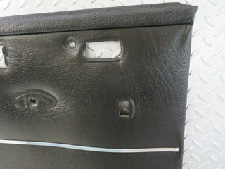 W108 rear left door card black used OEM