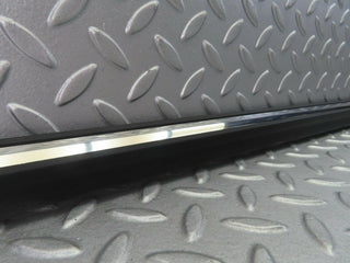 W123 front left door lower trim new OEM