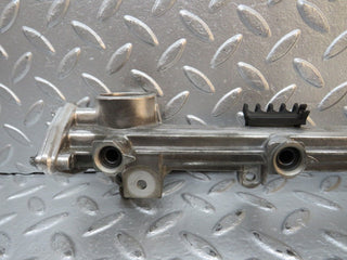 W124 Wagon fuel injector rail used OEM