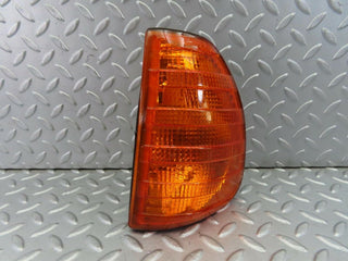 W123 indicator light front left used OEM