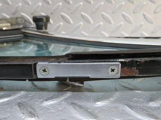 W109 front left quarter window glass used OEM