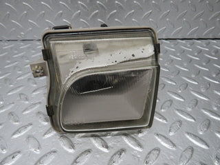 R129 SL front left fog light used OEM
