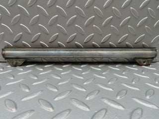 W108 front left door glass holder used OEM