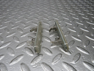W124 rear license plate light used OEM