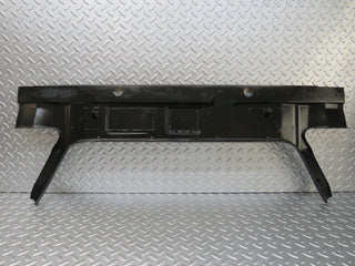 W124 trunk lock trim panel used OEM