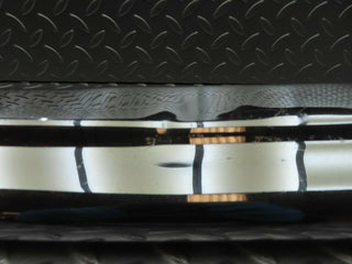 W108 rear left upper bumper corner used OEM