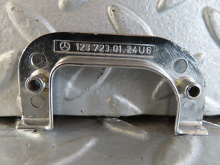W123 left chrome door latch trim used OEM
