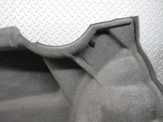 W124 trunk panel cover left used OEM