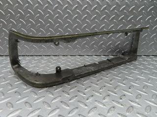 R107 SLC tail light frame left side used OEM