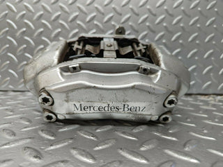 W211 front left brake caliper used OEM