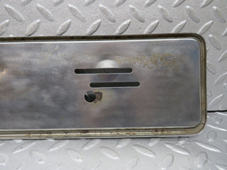 W123 front chrome number plate holder used OEM