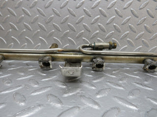 W124 Cabriolet fuel injector rail used OEM