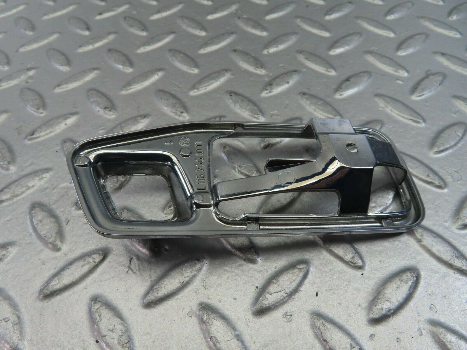 10833 Mercedes-Benz W123 230E Chrome Frame For Door Opener Left 1167660111