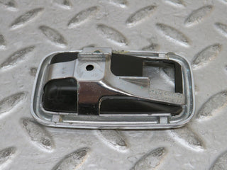 W123 chrome frame for door opener right used OEM