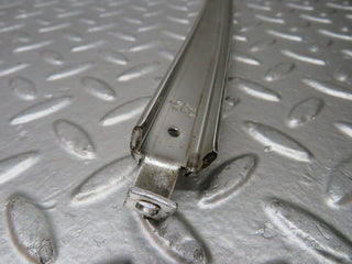 W123 rear right chrome window channel used OEM