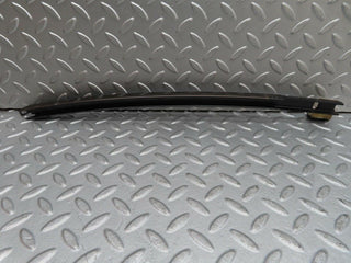 W124 rear left door upper window channel used OEM