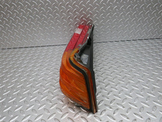 W123 tail light left side used OEM