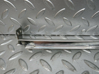 W108 rear left chrome window channel used OEM