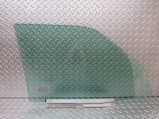W124 front left door window glass used OEM
