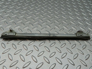 W108 front left door glass holder used OEM