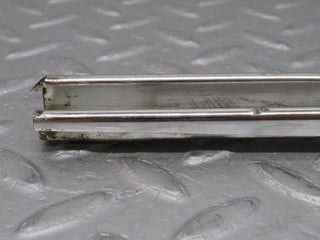 W108 front left door chrome window channel used OEM