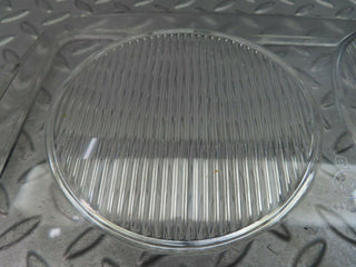 W123 headlight lens left used OEM