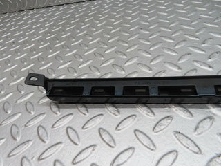 W140 headlight lower trim left side used OEM
