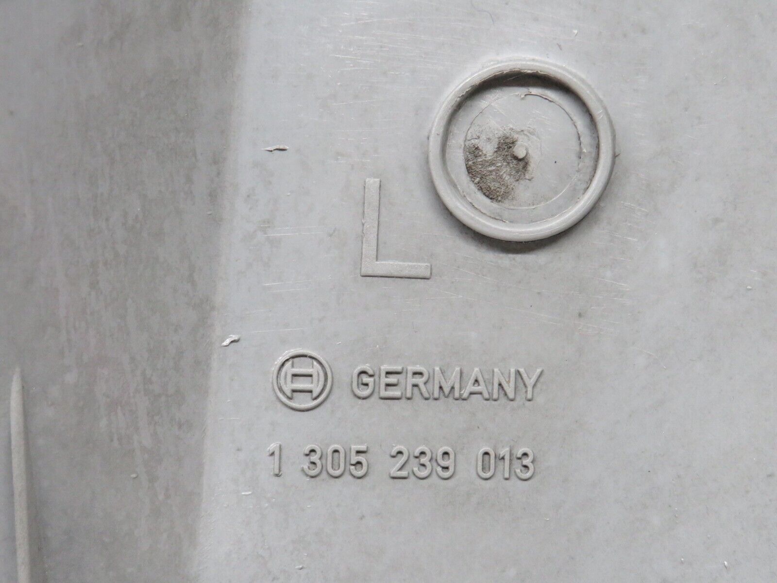 25157 Mercedes-Benz W201 190D Headlight Back Cover Bosch 1305239013
