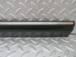 W123 front left door lower trim used OEM