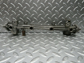 W124 Coupe fuel injector rail used OEM