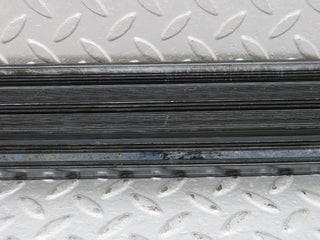 W123 front left door sill trim black used OEM