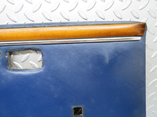 W109 rear left door card blue used OEM