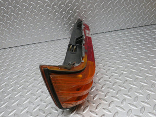 W123 tail light left side used OEM