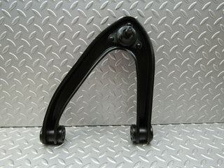 W115 upper control arm front left used OEM