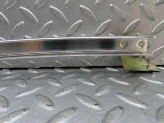W123 rear left door chrome window channel used OEM