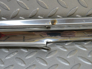 W109 front left door sill chrome used OEM