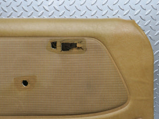 W123 front left door card beige used OEM