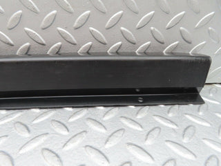 W123 cable channel cover front left used OEM