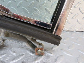 W109 front left quarter window glass used OEM